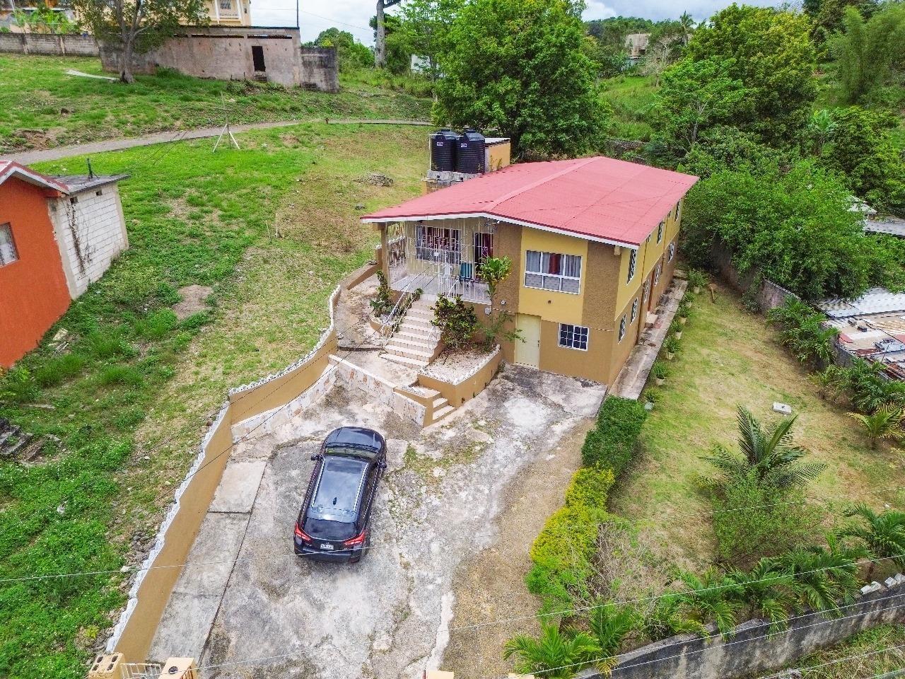 5 Bedroom 3 Bathroom House for sale at Balcarres Road, Manchester, Jamaica